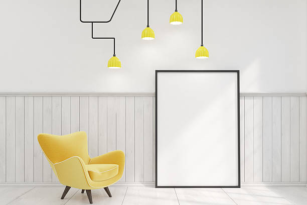 istock Room with a framed vertical poster and a yellow armchair 628558866