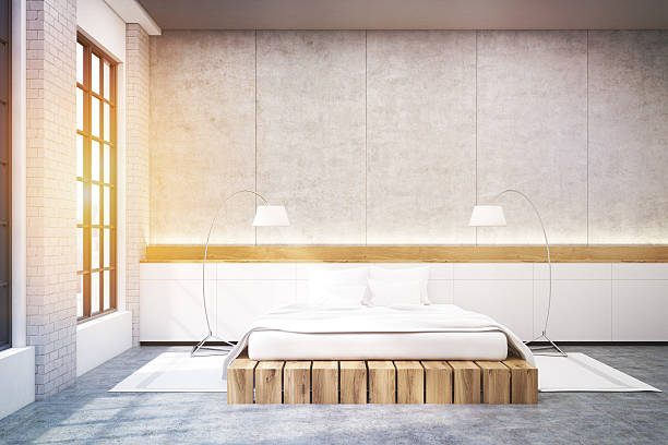 istock Master bedroom with a double bed and two lamps, toned 628561190