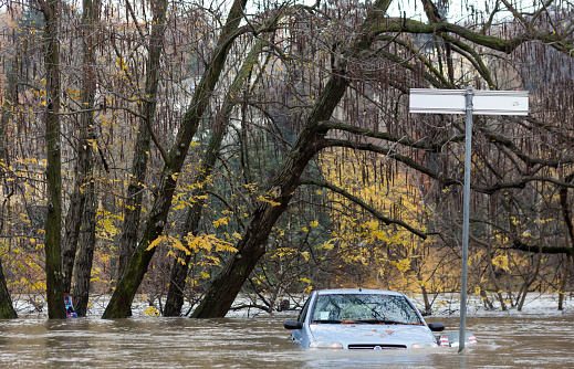flloding In Turin, Italy: car under water