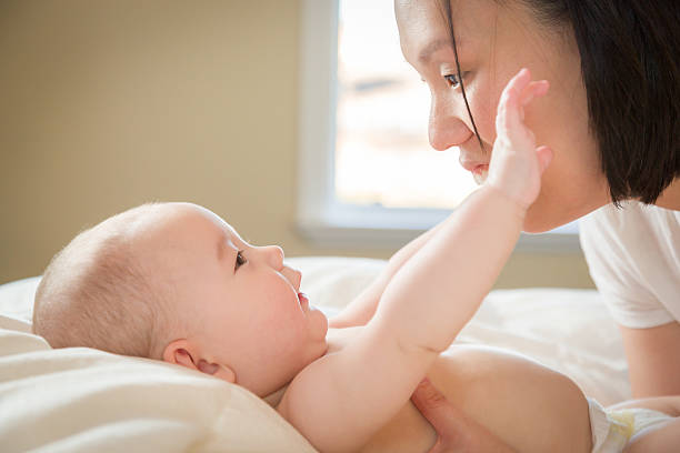 istock Mixed Race Chinese Caucasian Baby Boy with Mamma 628564428
