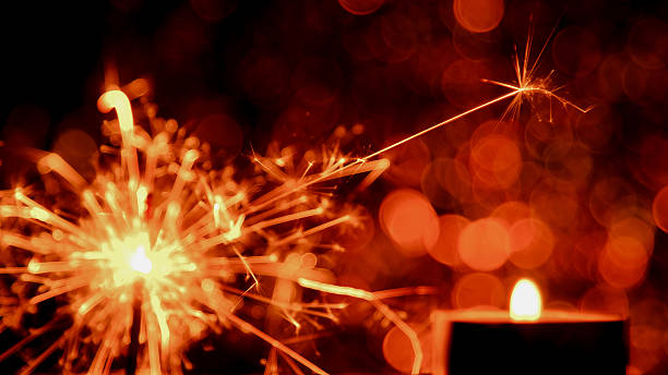 istock Blur image style. Christmas and New Year party sparkler 628564866