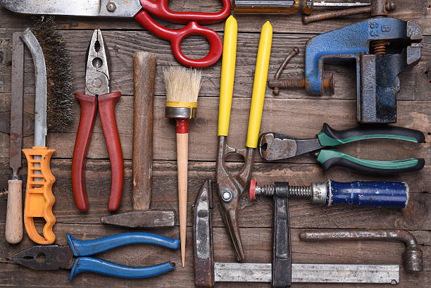 istock Set of old tools on wooden background 628566264