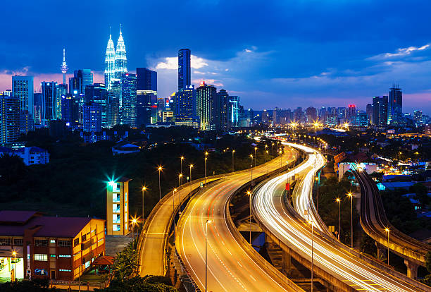 istock Kuala Lumpur Illuminated Skyline At Night 628567376