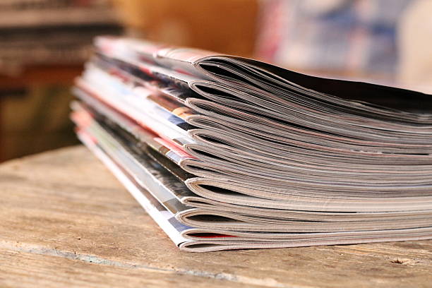 istock Magazines on the wooden table 628567536