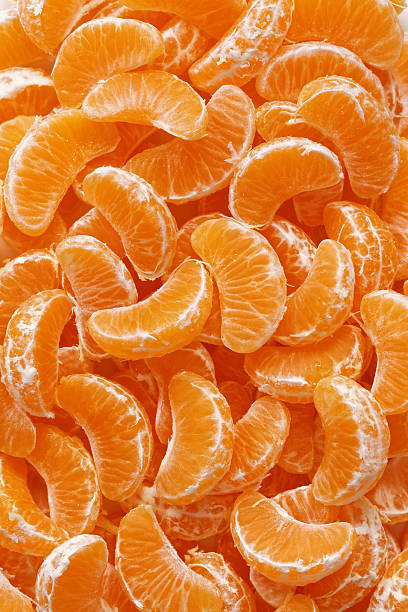istock Peeled clementine wedges 628568466