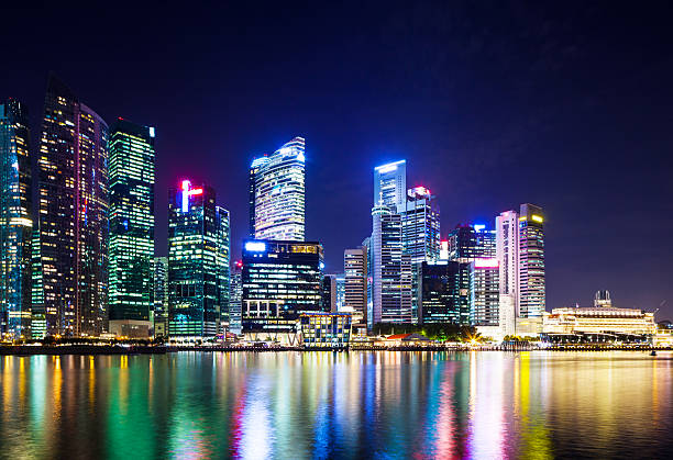 istock Illuminated Singapore Cityscape 628578860