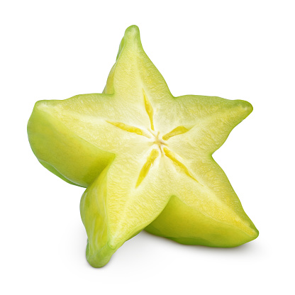 Slice of carambola fruit or starfruit isolated on white background with clipping path