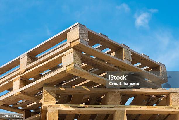 Piled Up Pallets Stock Photo - Download Image Now - Pallet - Industrial Equipment, Wood - Material, Timber