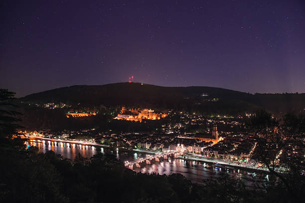 istock Marvellous night view with star sky over in Heidelberg 628602116
