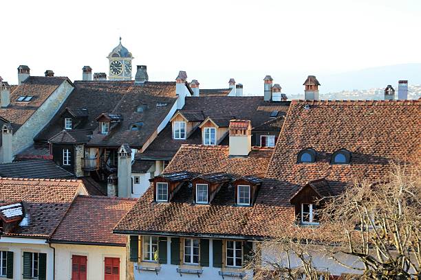 View to facades of historic buildings in Salzwedel, Germany, under a blue sky.