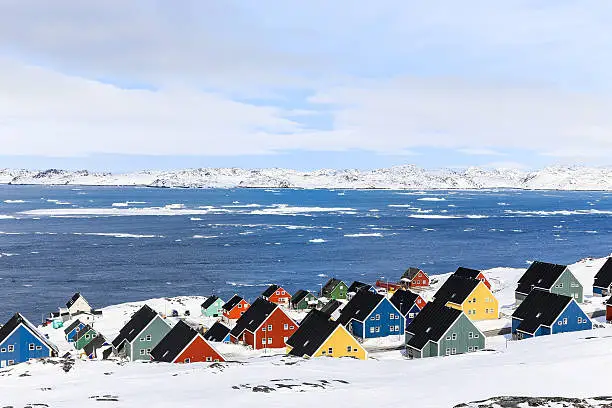 Colorful inuit houses in a suburb of arctic capital Nuuk