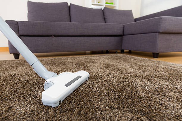 istock Vacuum cleaner cleaning a carpet 628609114