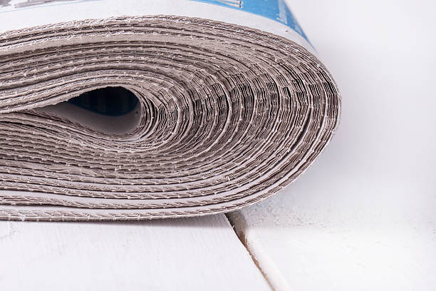 istock Heap of folded newspapers 628610526