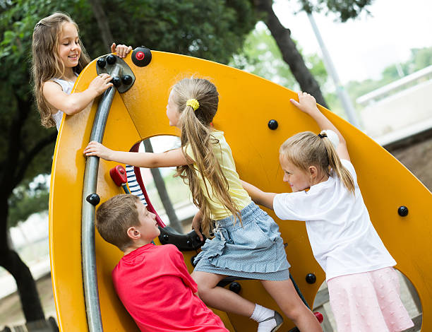 istock children playing on urban playground 628611342