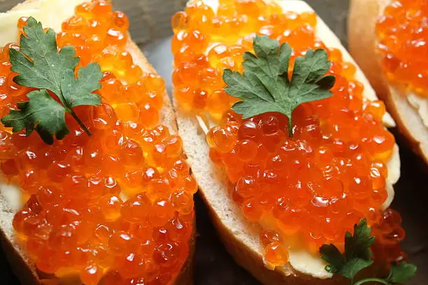 Home and delicious food of red caviar on the bread for a healthy and happy life