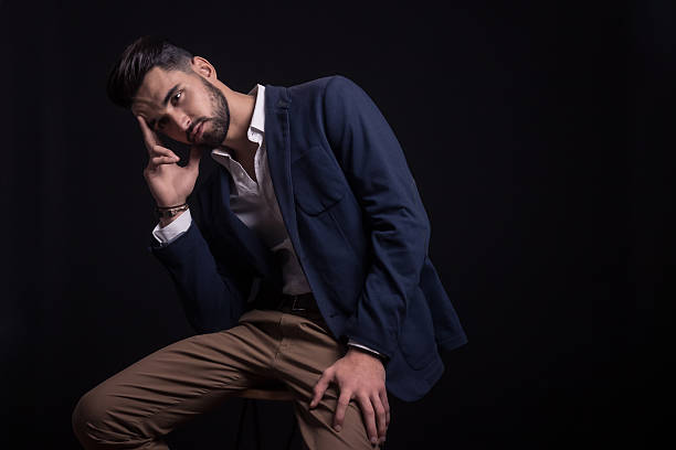 istock Worried young fashion model man. 628611664