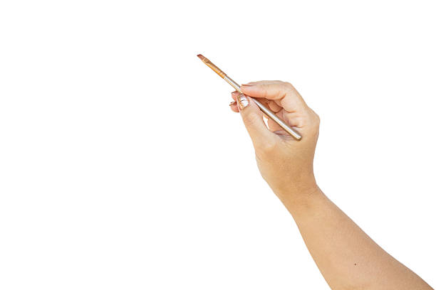 istock Hand holding brush cosmetic 628612786