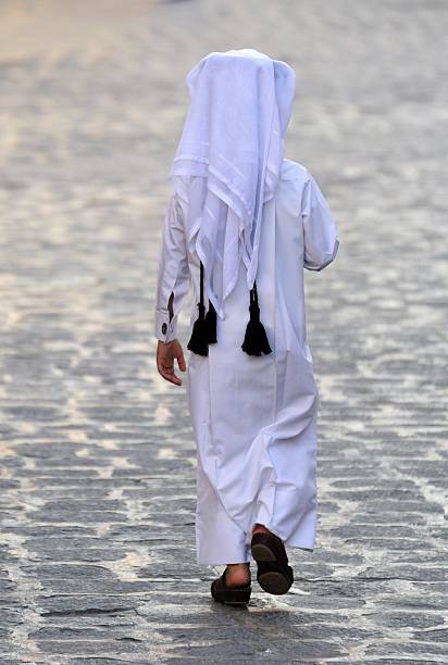 istock Figure of unidentifiable Arabic boy 628614114