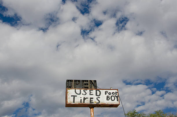 istock Used Tires Sign on Route 66 628616254