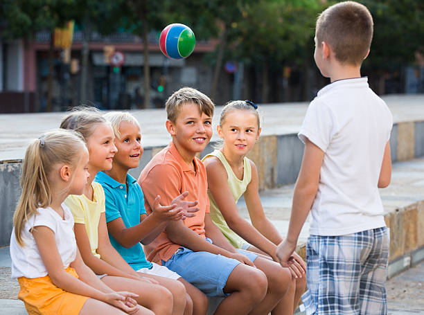 kids playing ball together