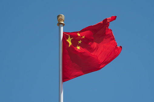 Waving Chinese national flag