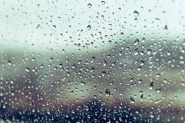 istock raining on the glass off window ferry boats for background. 628648970
