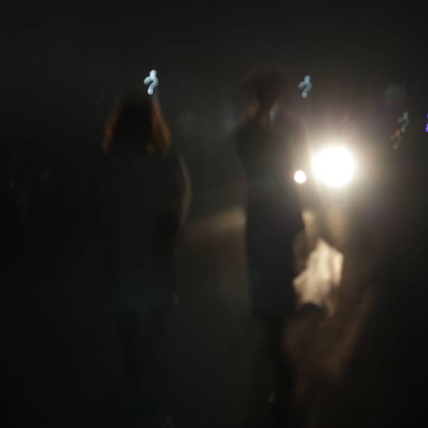 istock Defocused Young Women in Car Headlights 628650342
