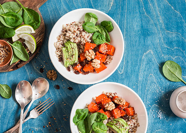 Quinoa with pumpkin, spinach and avocado. Healthy quinoa bowl.