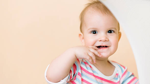 istock the kid is very happy when being photographed 628659034