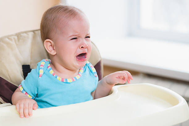 istock nine baby cries before feeding at home 628659446