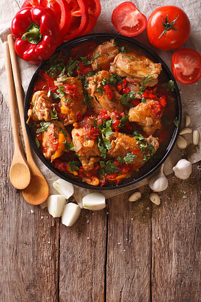 istock Chakhokhbili chicken stew with vegetables on the table. vertical 628659468