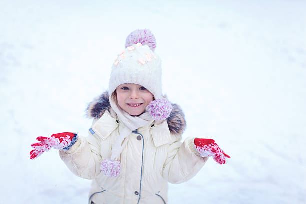 istock Adorable little girl having fun on winter day 628662014
