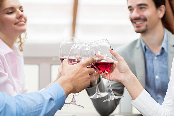 istock Young Business People Group Sitting At Cafe Table Toasting, Hold 628664100