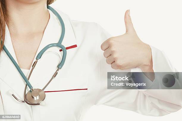 Medical Doctor With Stethoscope Shoeing Thumb Up Stock Photo - Download  Image Now - Apron, Body Care, Business Finance and Industry - iStock