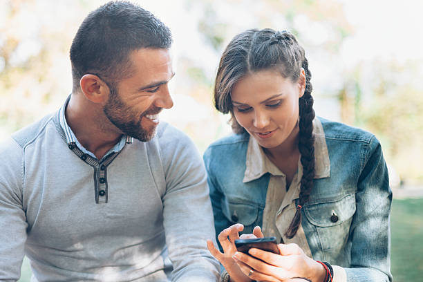 istock Young couple having fun in park 628665732