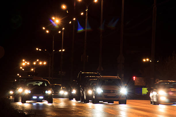 istock Cars drive on highway in night. 628694638