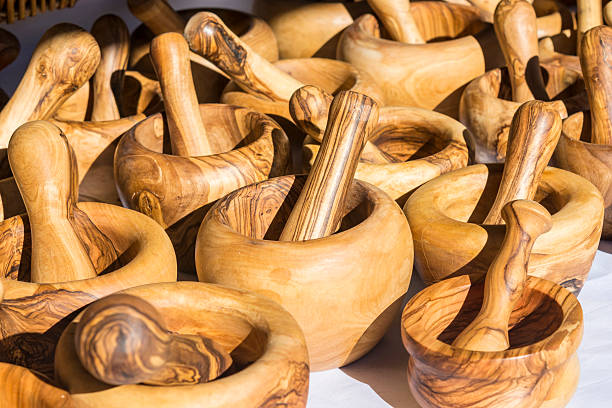 istock Mortar and pestle of olive wood 628695372