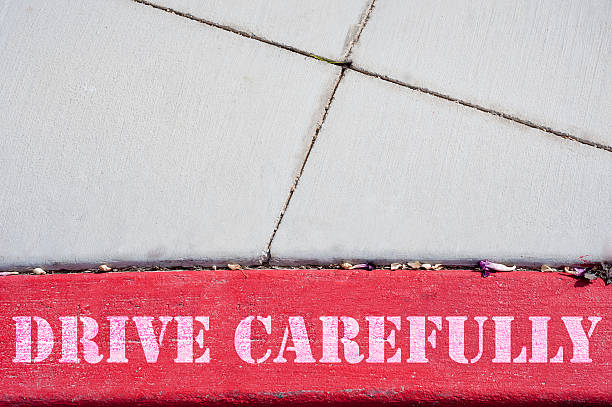 istock Lane with the text Drive carefully 628695870