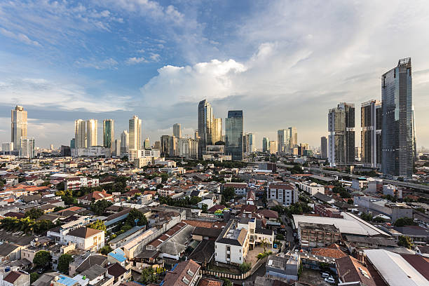 Sunset over Jakarta Sunset over Jakarta skyline business district in Indonesia capital city. jakarta skyline stock pictures, royalty-free photos & images