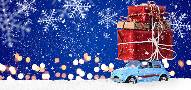 istock Retro toy car with christmas gifts 628711582