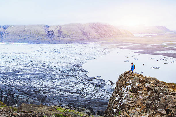 istock hiking in Iceland in winter, backpacker enjoying panoramic landscape 628711610