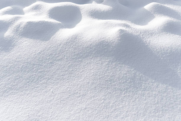 istock background of fresh snow texture in blue tone 628711846