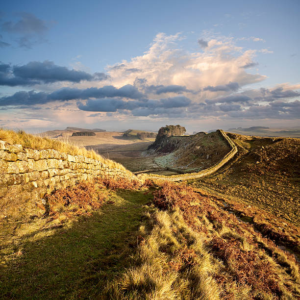 istock Sunset illuminates Hadrian’s Wall in Northumberland, England 628712356
