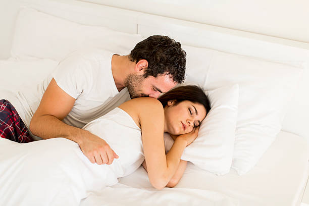 istock Young couple in the bed 628713308