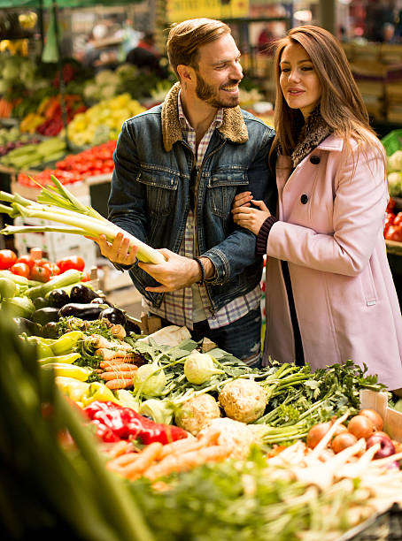 istock Couple at food market 628728128