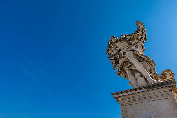 istock Angel statue at Sant Angelo Bridge in Rome 628735470