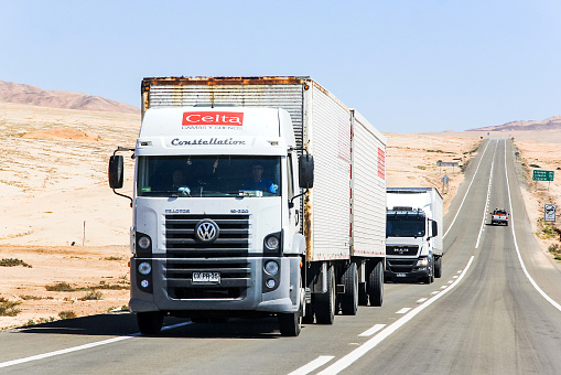 Antofagasta, Chile - November 18, 2015: Cargo truck Volkswagen Constellation drives at the Pan-American Highway.