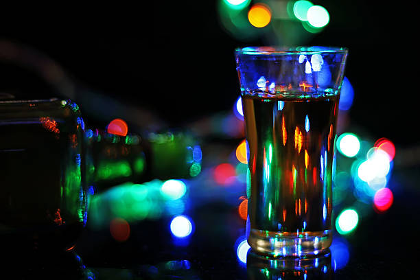 istock Wiskey in glass with bokeh light on black background . 628737926