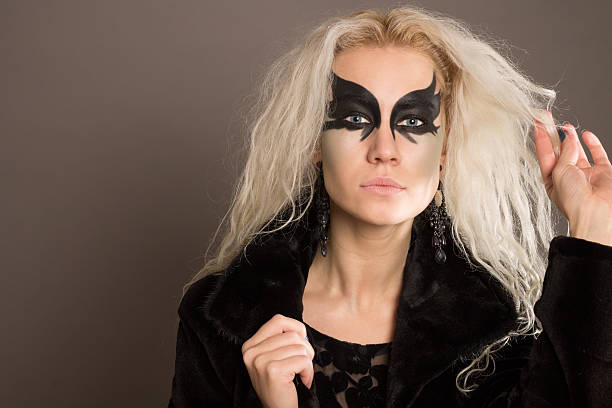istock Young Woman with Black Mask on Her Face 628746518