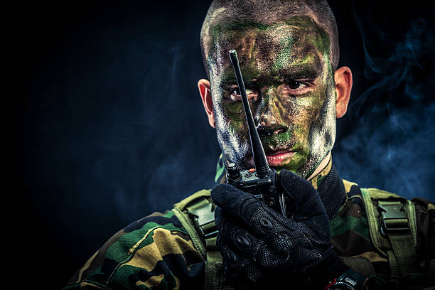 Marine With Walkie Talkie Stock Photo - Download Image Now - Camouflage,  Camouflage Clothing, Face Paint - iStock